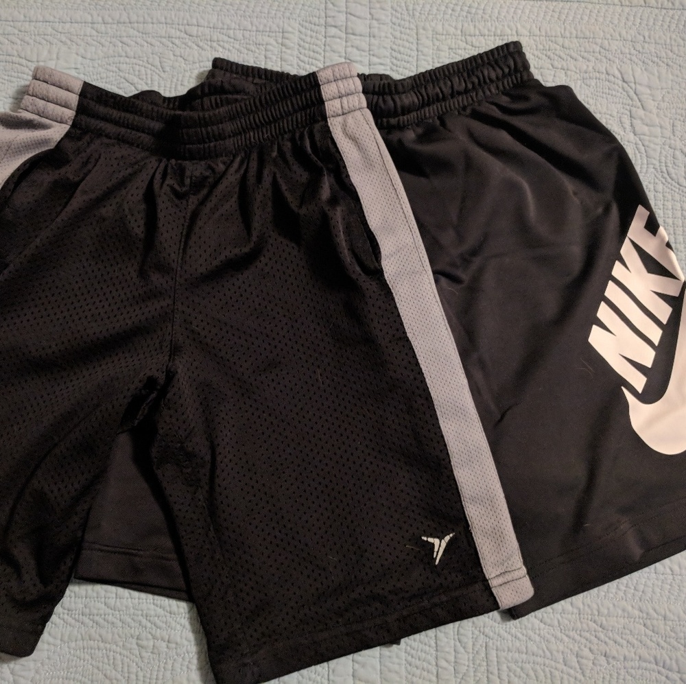 One pair of nike shorts with bonus shorts